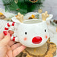Taza Reno + calcetines navideños.